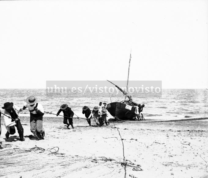 losada-ficha-3-grupo-de-hombres-amarrando-la-barca-de-pesca-copia